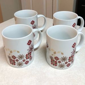 4 Starbucks snow flake and poinsettia mugs